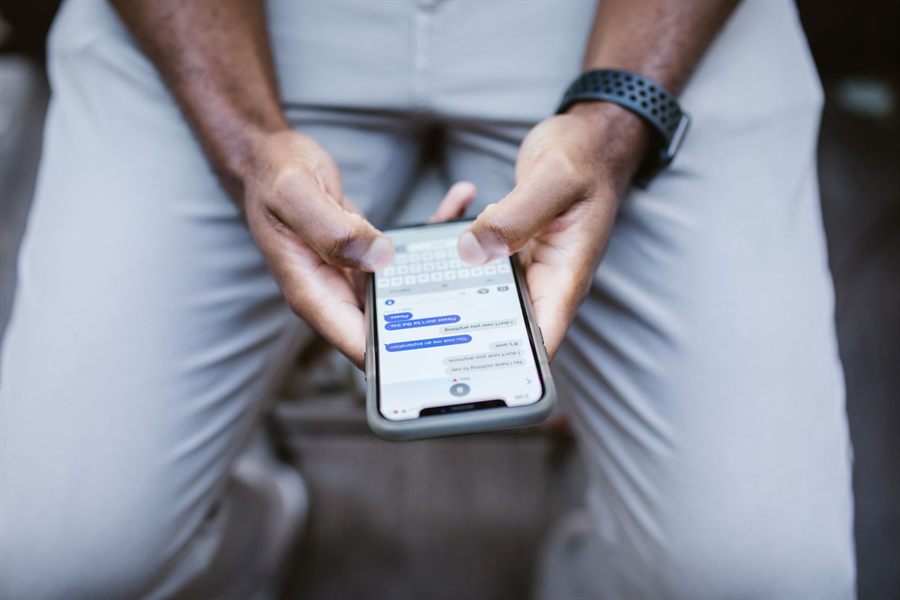 Person reading a message on a smartphone